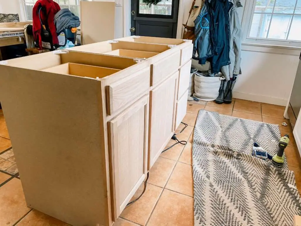 How to secure kitchen island to floor?