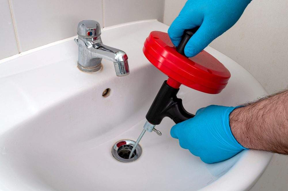 Why Does My Kitchen Sink Keep Clogging?: Top Fixes!